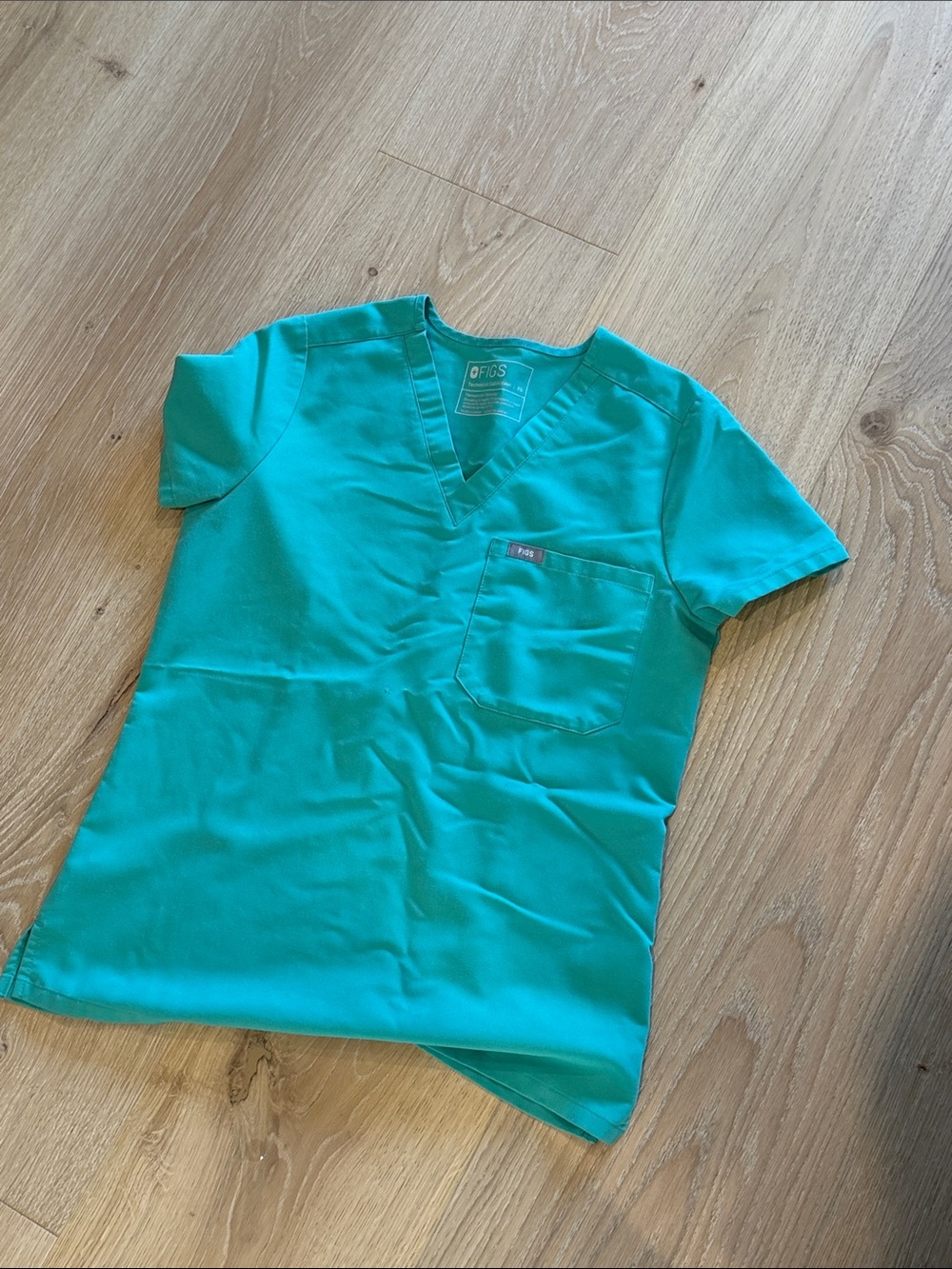 Figs women’s Teal V-Neck Scrub Top with Chest Pocket